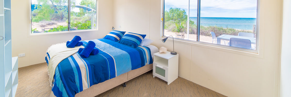 Mackerel-Islands-accommodation-beachfront-cabin-bedroom-1-slider